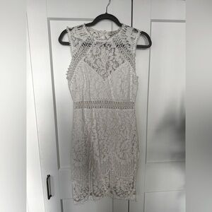 White cocktail dress with lace overlay/cut-out, high-neck, sleeveless from Honey